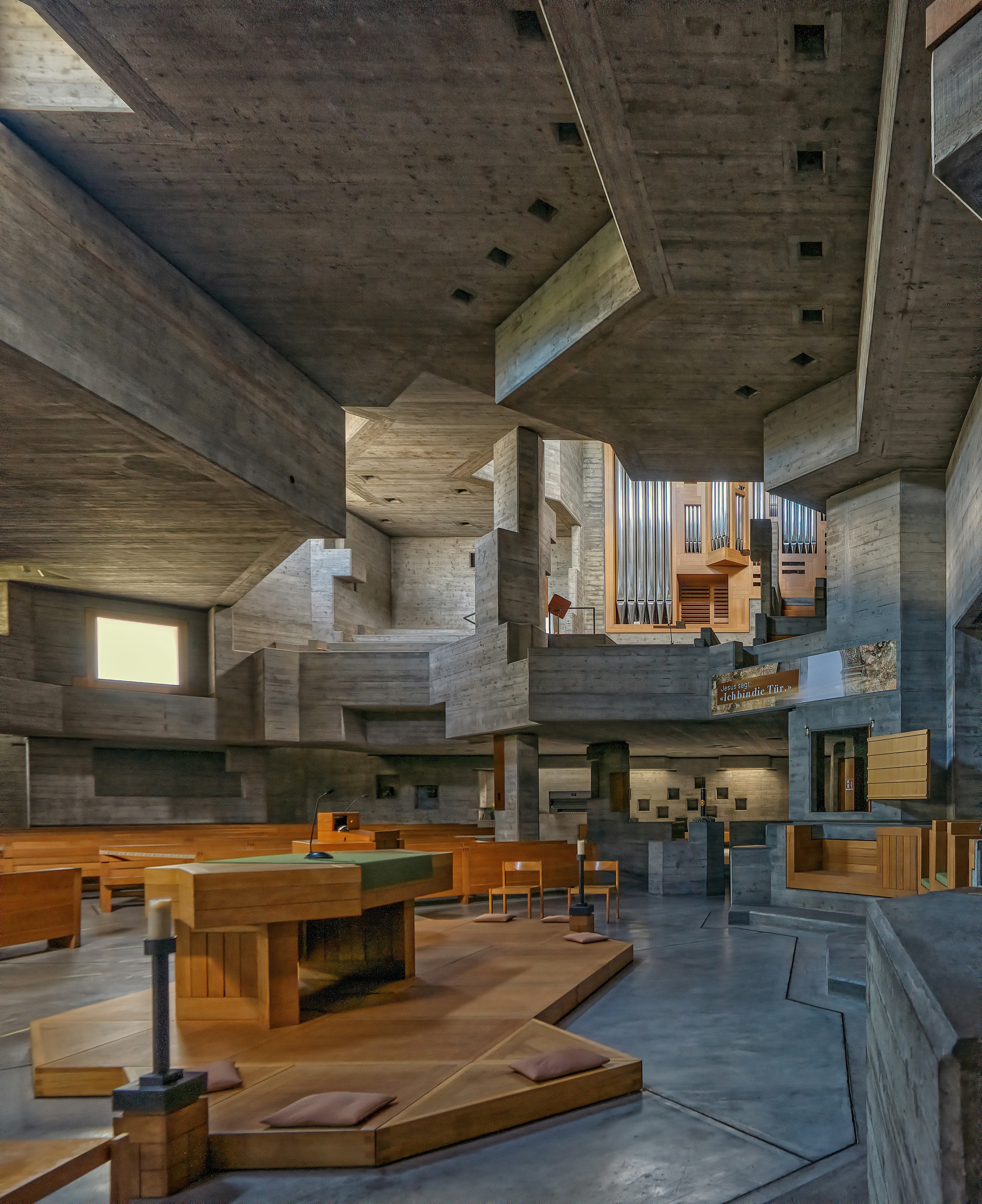 brown wooden tables and chairs inside building